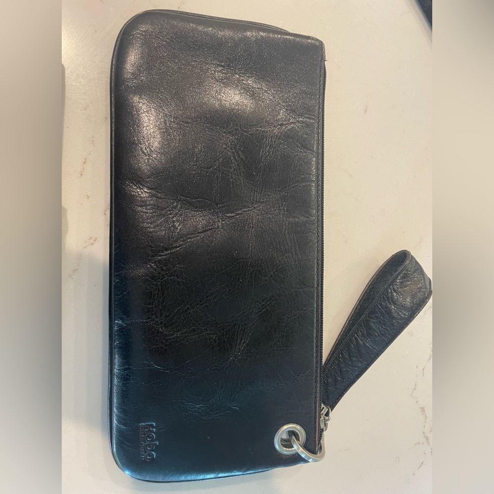 Hobo black leather wristlet with red liner